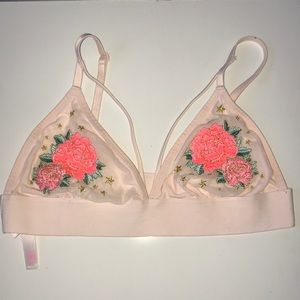 A rose embroidered baby pink bralette